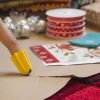 Nimble one-finger cutter cutting paper