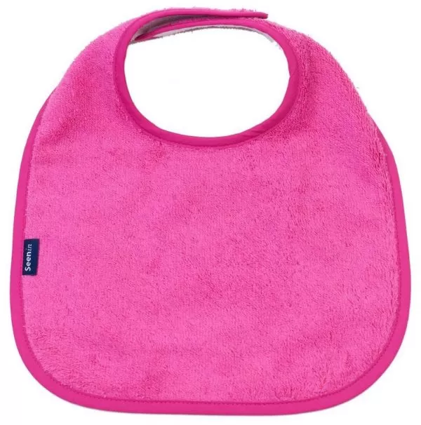Seenin dribble bib for a disabled child in pink