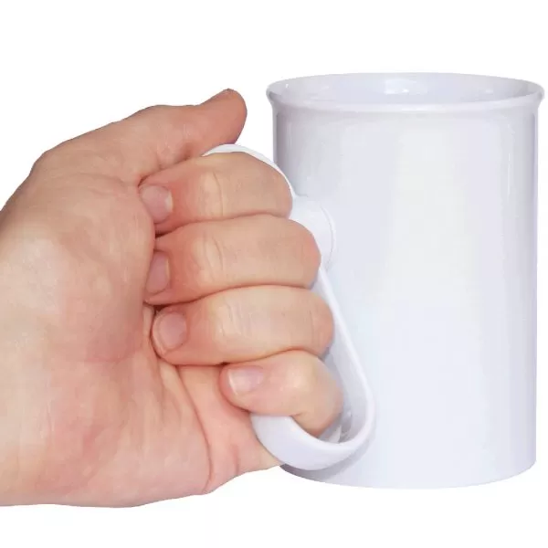 Handsteady drinking aid being held by a hand