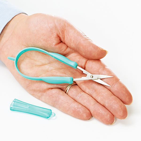 Peta Mini Easi-Grip scissors being held in a hand