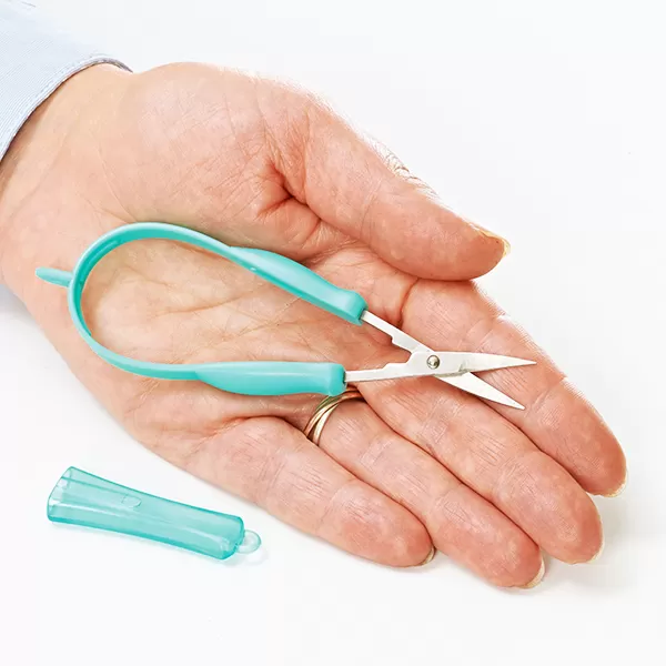 Peta Mini Easi-Grip scissors being held in a hand