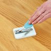 Peta table-top Easi-Grip nail clippers being pressed down by a hand