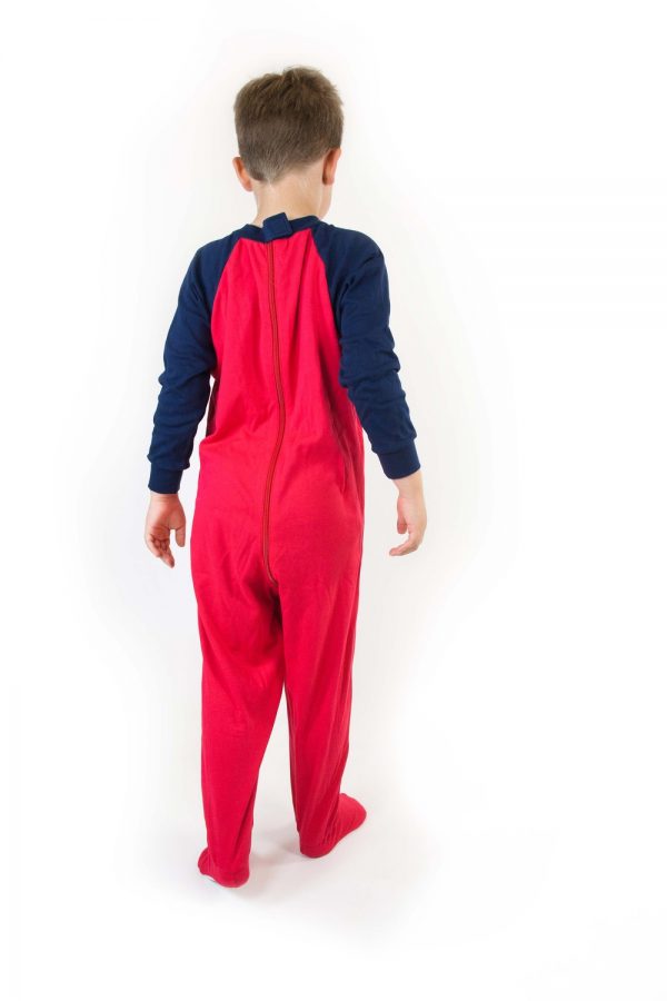 Young boy from behind stood wearing Seenin children's red and navy zip sleepsuit