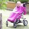 Disabled girl in fuchsia Seenin total fleece wheelchair cover