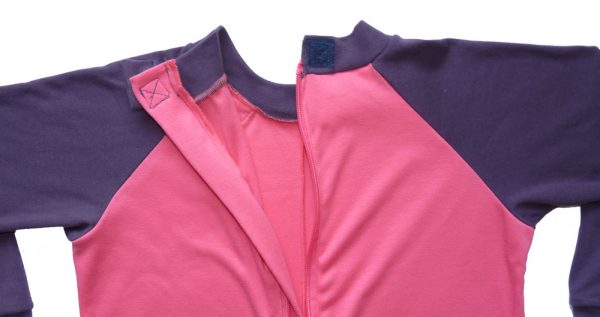 Hidden zip fastening on the back of Seenin children's pink and plum sleepsuit