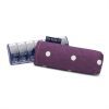 Image is a photograph of a plastic pill box with a dark purple with white spot-designed case cover.
