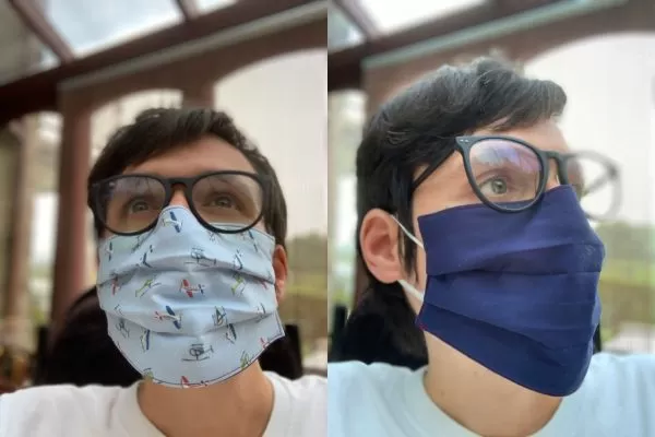 Image is two photographs side-by-side, of a man wearing an Aviation-themed fabric face mask. In the first photograph he is facing the camera to show the design and fit of the mask. The fabric's design features helicopters and turboprop planes in red, white, green and blue on a light blue background. In the second image the man is looking to the right, and he is wearing the mask inside-out to illustrate that the inner lining is navy blue in colour.