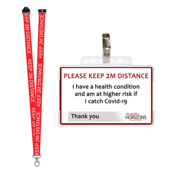 Image is a plastic ID card to promote social distancing, in a transparent plastic ID card holder with badge clip and red lanyard, with white text in capitals that reads “KEEP 2M DISTANCE”. On the ID card bright red text in capitals reads: "PLEASE KEEP 2M DISTANCE". Under this black text reads: "I have a health condition and am at higher risk if I catch Covid-19. Thank you". The bottom righthand corner features the Disability Horizons logo.