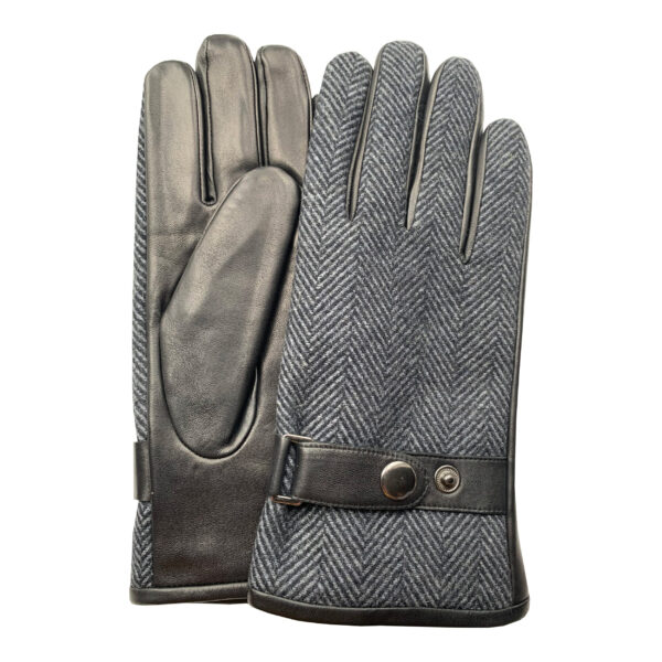 Image is a photograph of a pair of Hands of Warriors leather gloves with a herringbone tweed backing and wrist strap popper detail