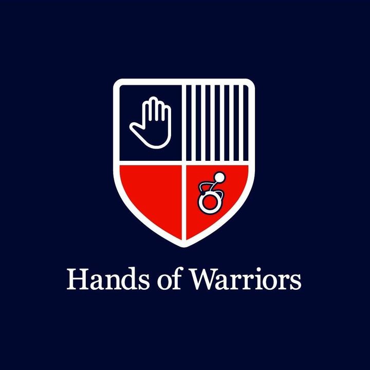 Image is the Hands of Warriors logo