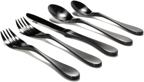 Image is a photograph of a 5 piece set of Matt black Knork cutlery on a white background, including Knork/fork, salad Knork/fork, knife, spoon and teaspoon