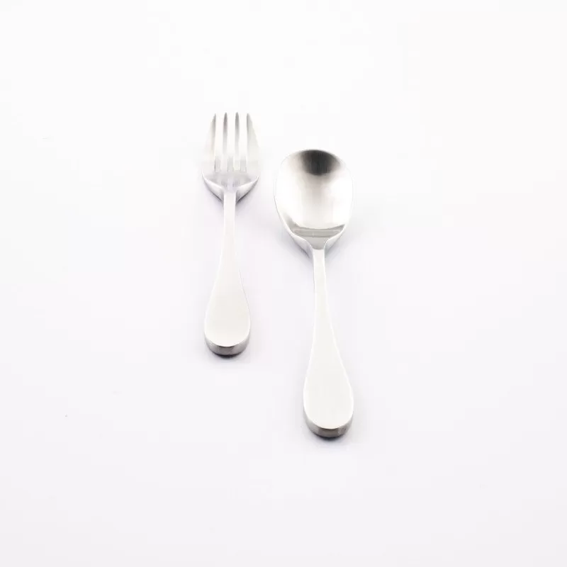 Picture showing the knork child fork and spoon vertical to a white background