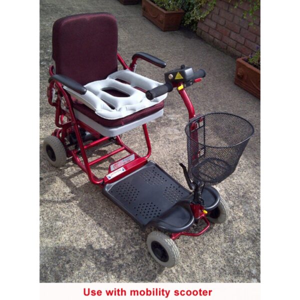 Cushion used as support for a red mobility scooter "use with mobility scooter"