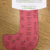 legi liner lines used to draw numbers on a christmas stocking "name 1,2"