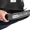 A cushion being placed in the ablesling cushion compartment