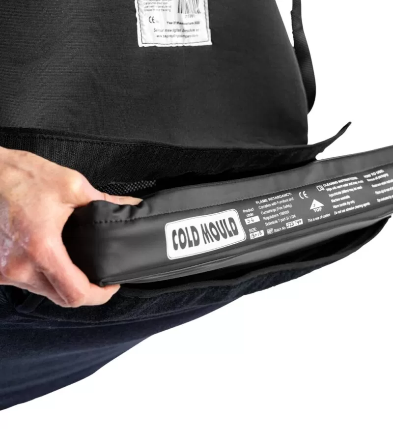 A cushion being placed in the ablesling cushion compartment