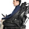 A side on shot of Josh in the ablesling in his wheelchair