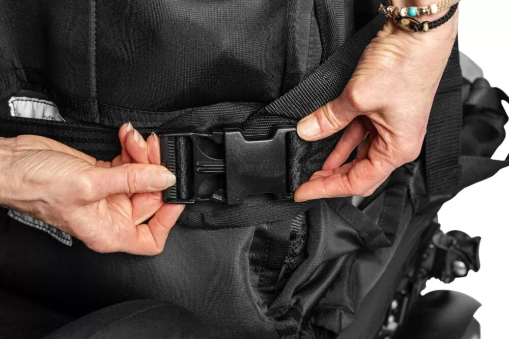 ablemove founder josh being secured to his ablesling with the ableharness