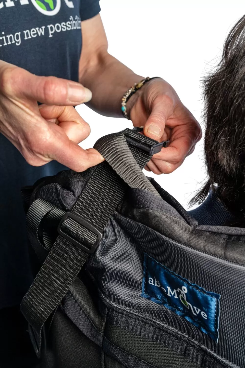 ablemove founder josh being secured to his ablesling with the ableharness