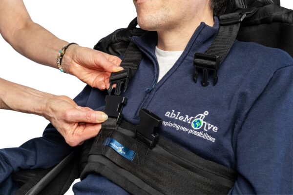 ablemove founder josh being secured to his ablesling with the ableharness