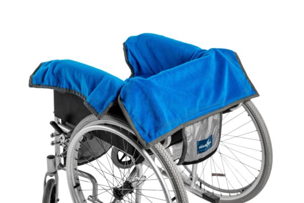 the able dry in a manual wheelchair with the back flap folded over