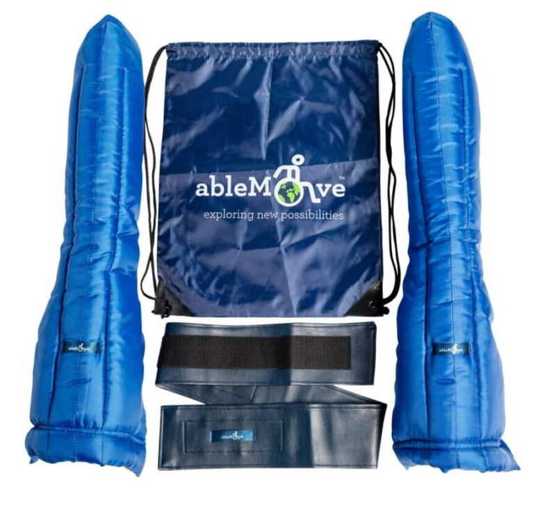 ableMove airport bag set with two blue arm rests pads, an able strap and ablemove drawstring bag