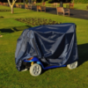 the splash scooter cover in use on a 4 wheeled scooter