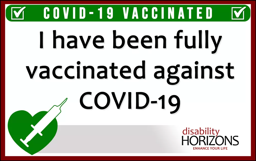 Image is of the Covid-19 vaccination ID card, featuring a green heart with a syringe at the bottom left, the Disability Horizons logo to the bottom right, and the following text "COVID-19 VACCINATED. I have been fully vaccinated against COVID-19"