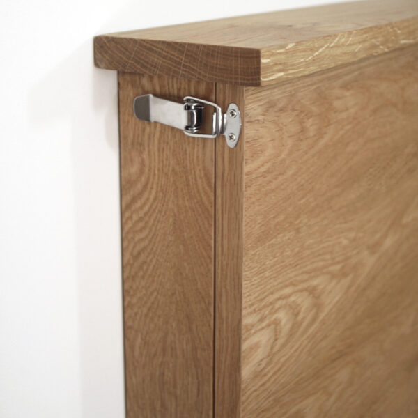 The secure closing mechanism on the height adjustable desk