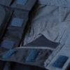 velcro fastenings on the navy chinos