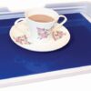 wide angle of the cup of tea and saucer on the middle of the tray