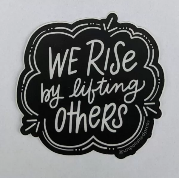 we rise by lifting others on white paper