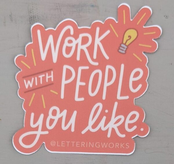 work with people you like sticker on a white table