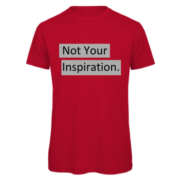Not your inspiration t-shirt in red. Reads:" Not your inspiration." in a black text with a grey background to the text