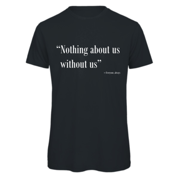 Nothing about us without us t-shirt in dark grey. Reads: "Nothing about us without us" in white text in quote marks