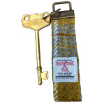 Harris tweed loop of fabric with a large RADAR key gift idea for dads with disabilities