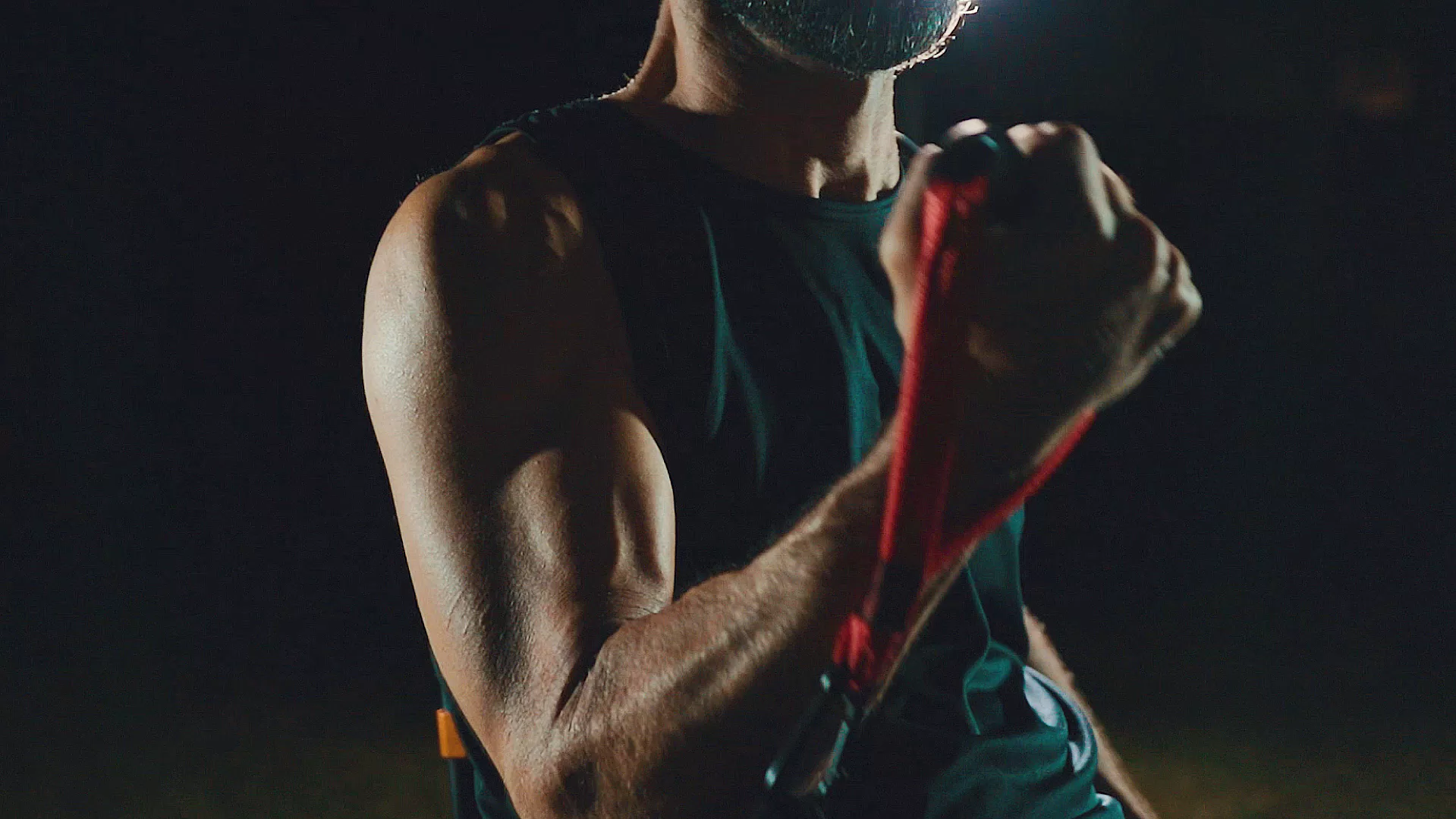 fusion wheel used at night, gripping with his fist.
