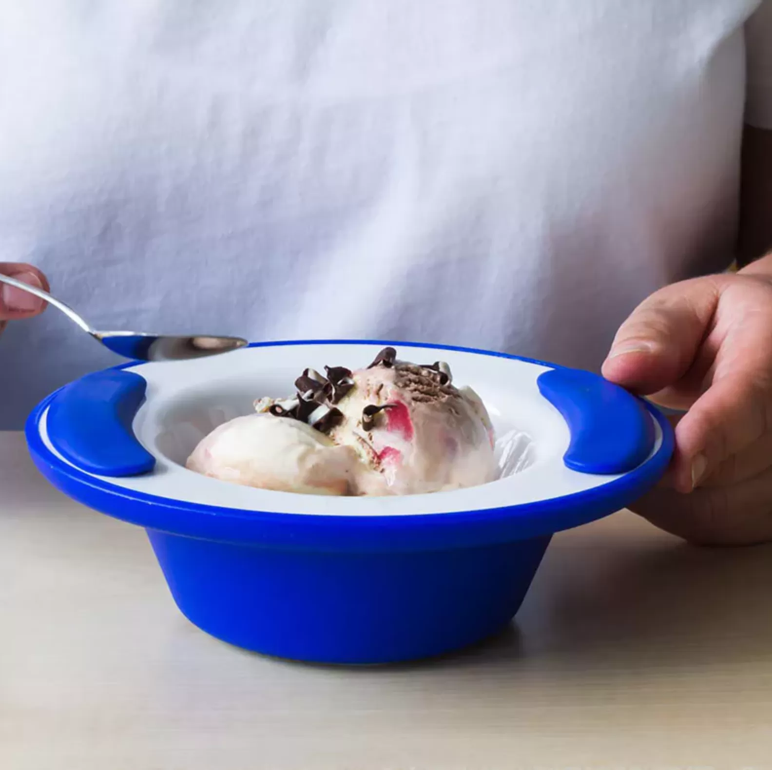 Ornamin Keep Warm Bowl with Ice Cream inside and in blue