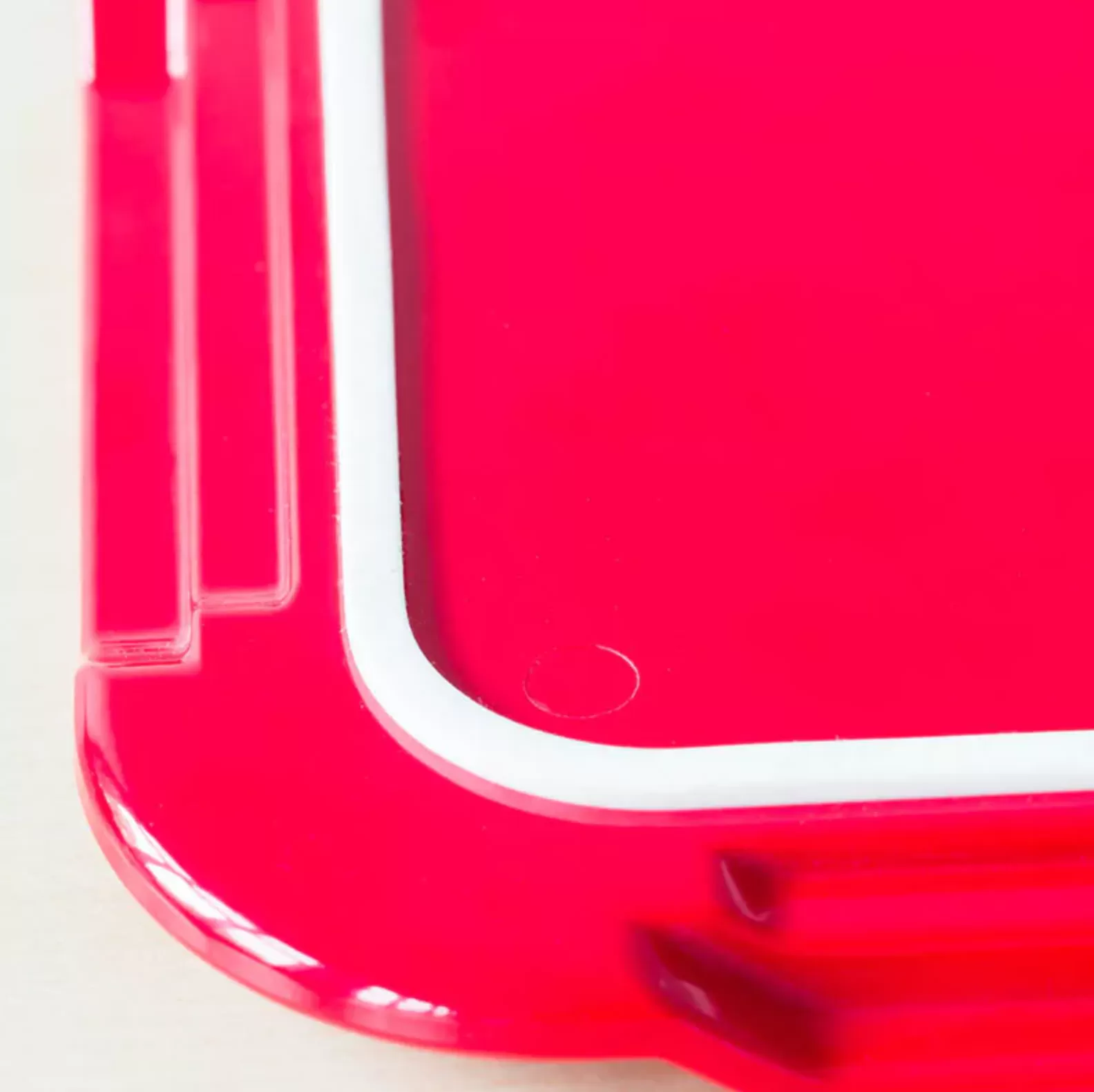 Underside of non slip tray showing non - slip ridge