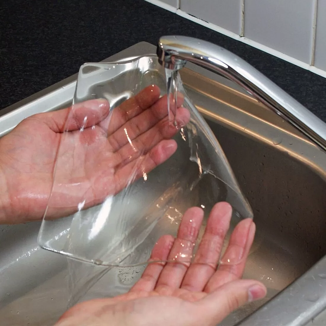 Tenura extreme mat being hand washed