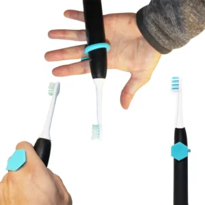 grip toggle being shown around a toothbrush to aid grip