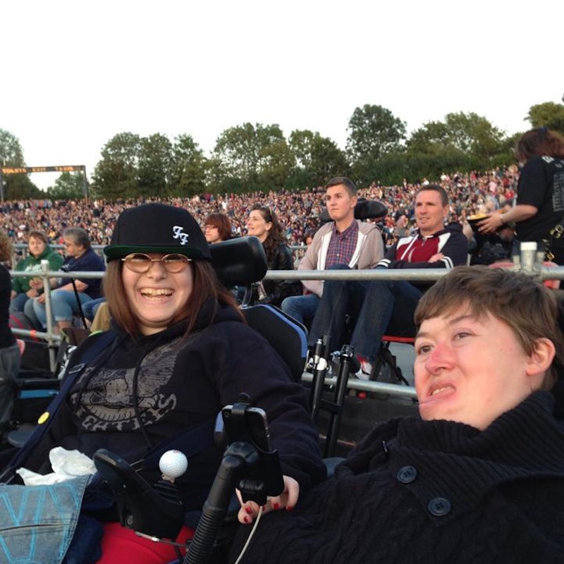 Emma with a friend at a Foo Fighters concert in 2015