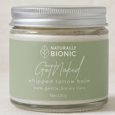 Jar of Naturally Bionic Get Naked whipped tallow balm with screw-top lid and green label.