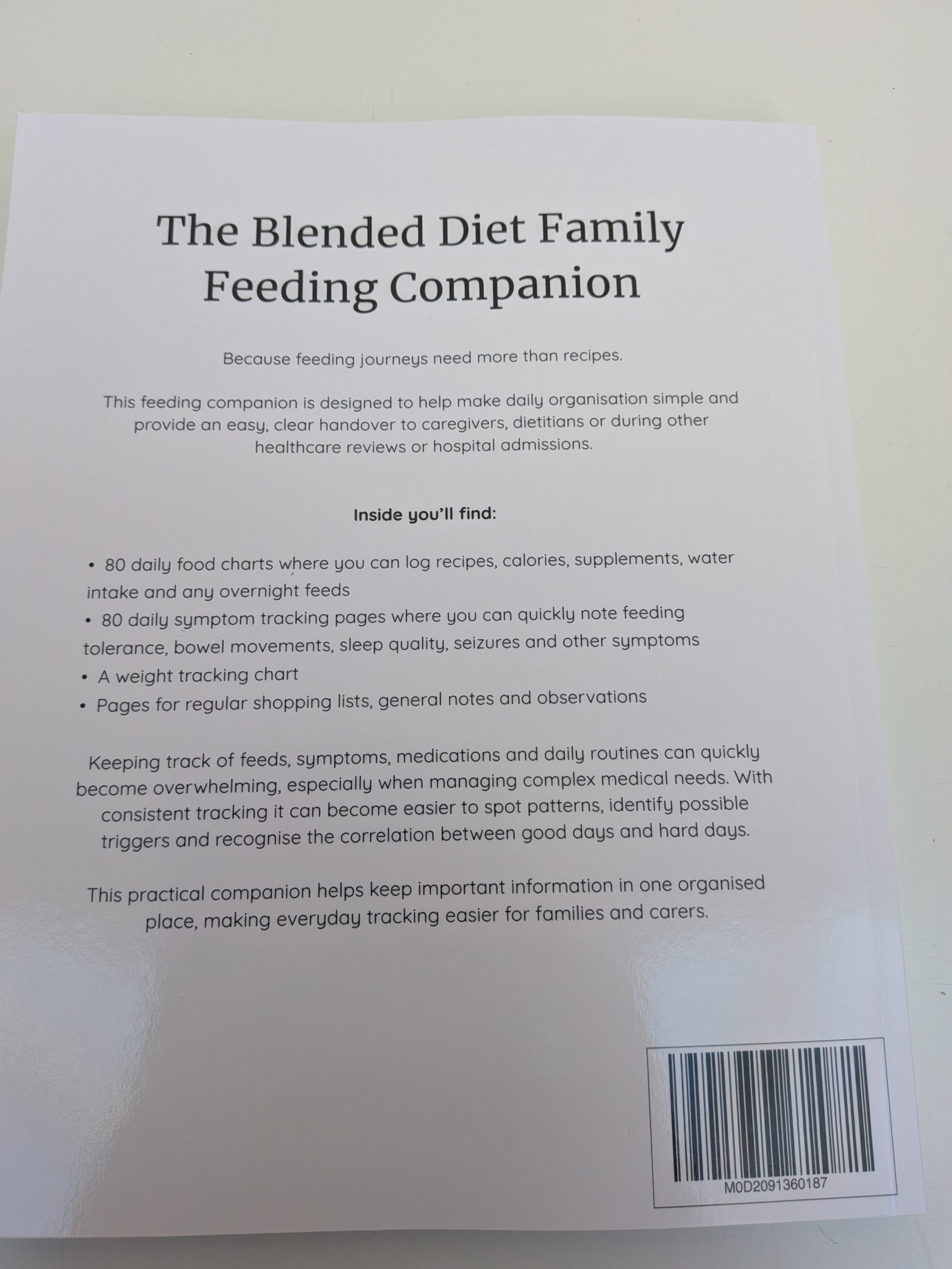 Back cover of The Blended Diet Family Feeding Companion, detailing daily tube feeding logs, symptom tracking, weight charts and notes.